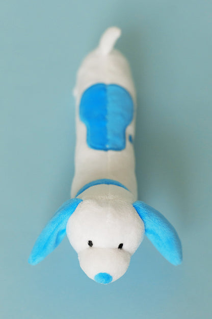 White and blue dog-shaped toy on a light blue background
